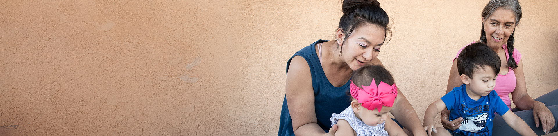 Two women with two babies